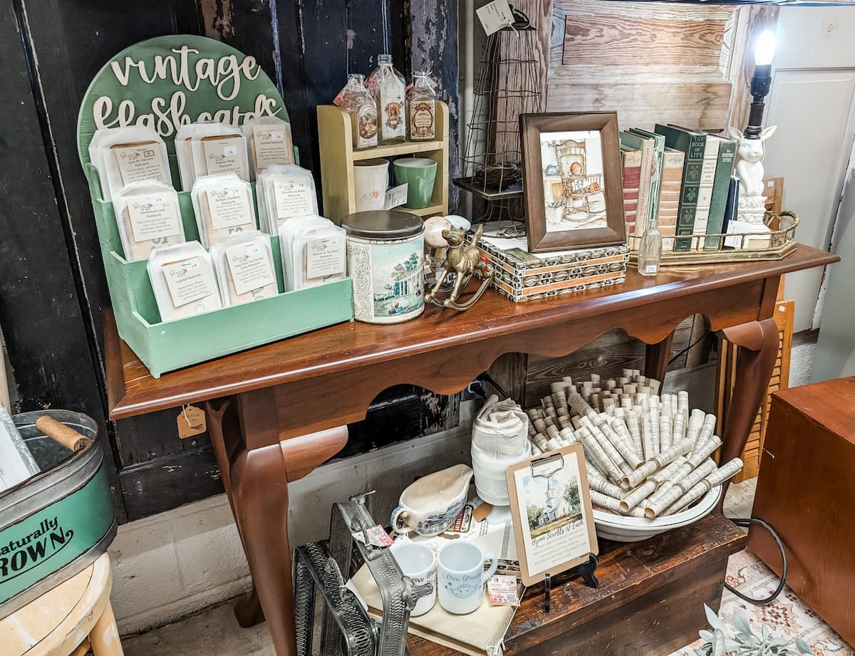 sofa table with displays in booth