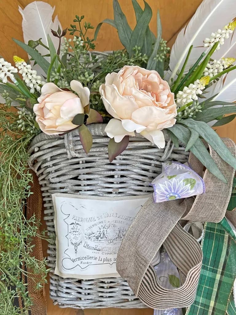 grey basket with flowers