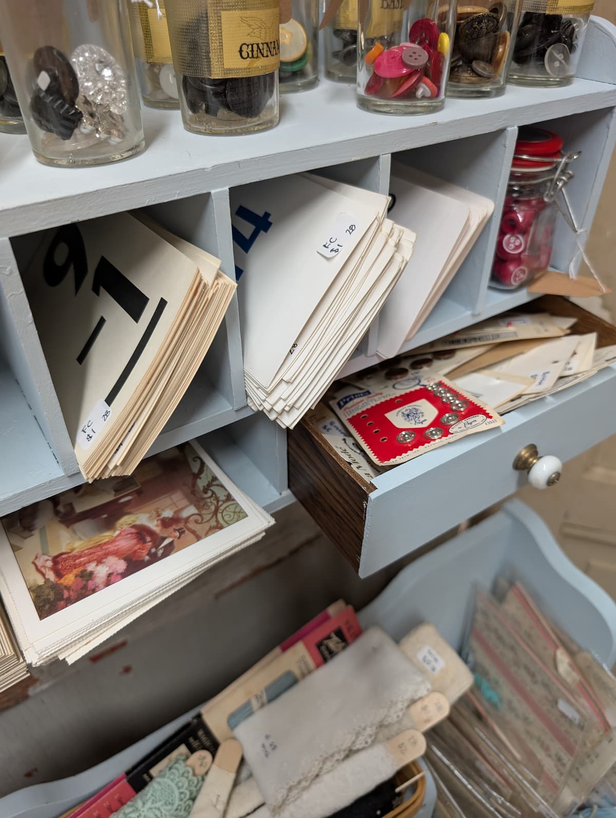 display of flashcards, postcards and buttons