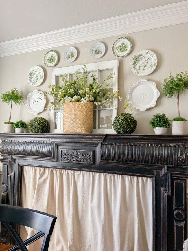 mantel with plates and plants