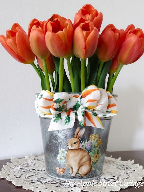 tulips in metal bucket