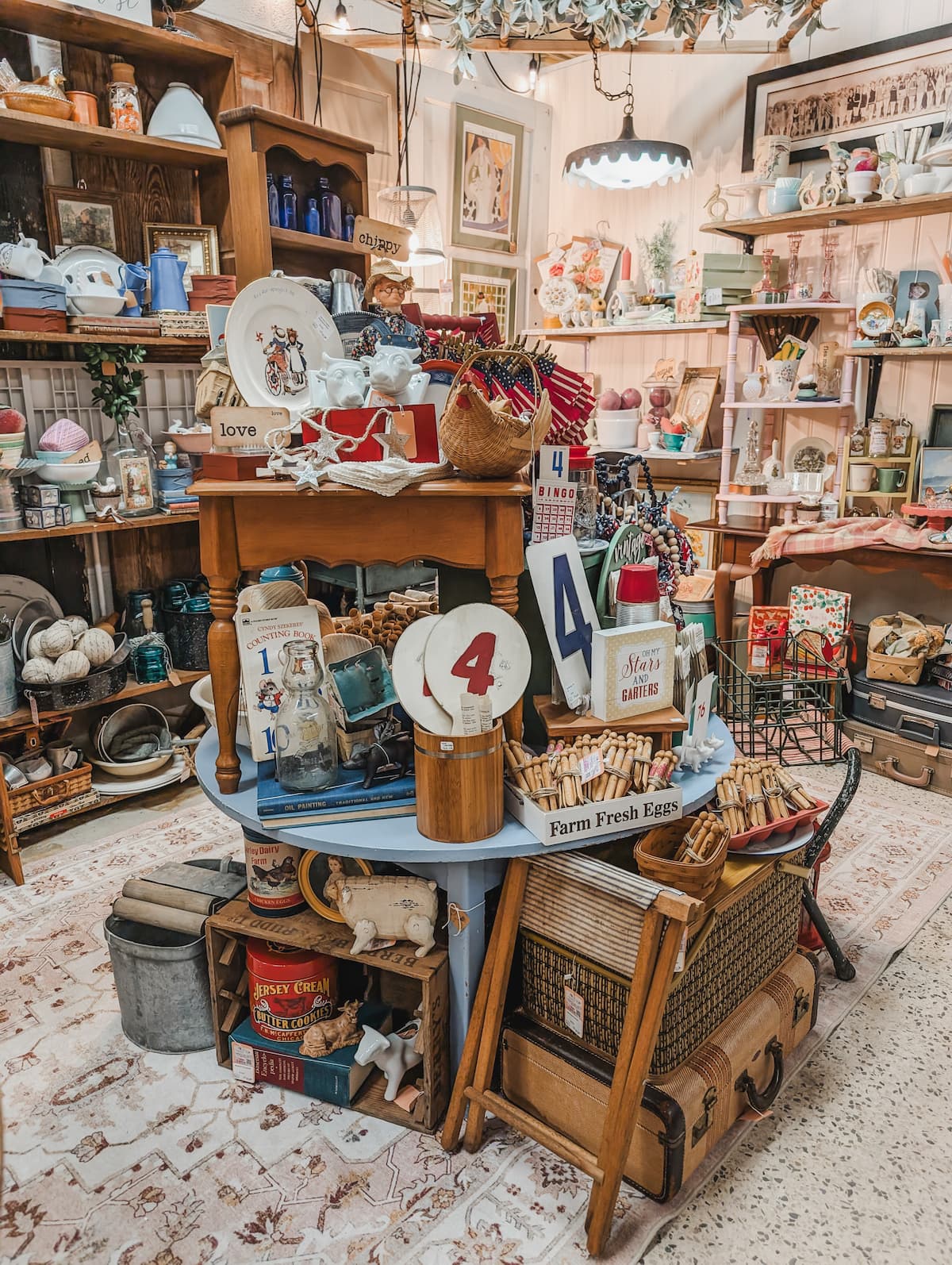 table styled with patriotic decor in the center of a vintage booth