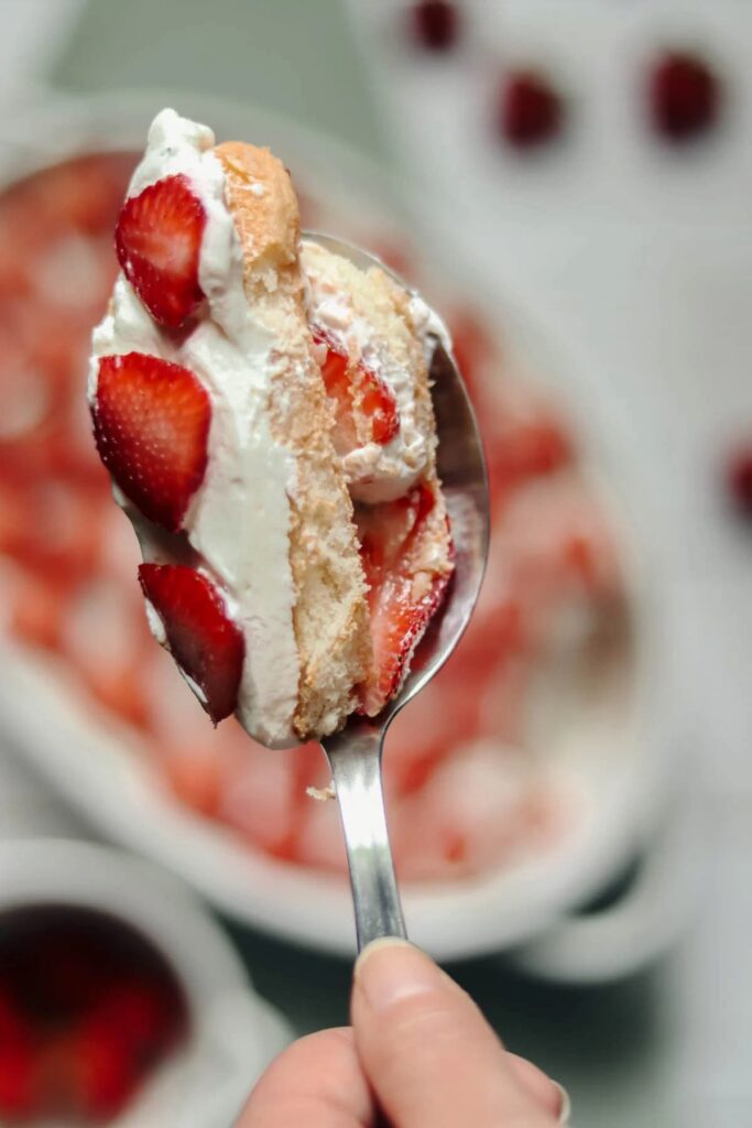 Spoon of strawberry dessert