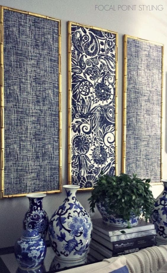 3 blue artwork panels