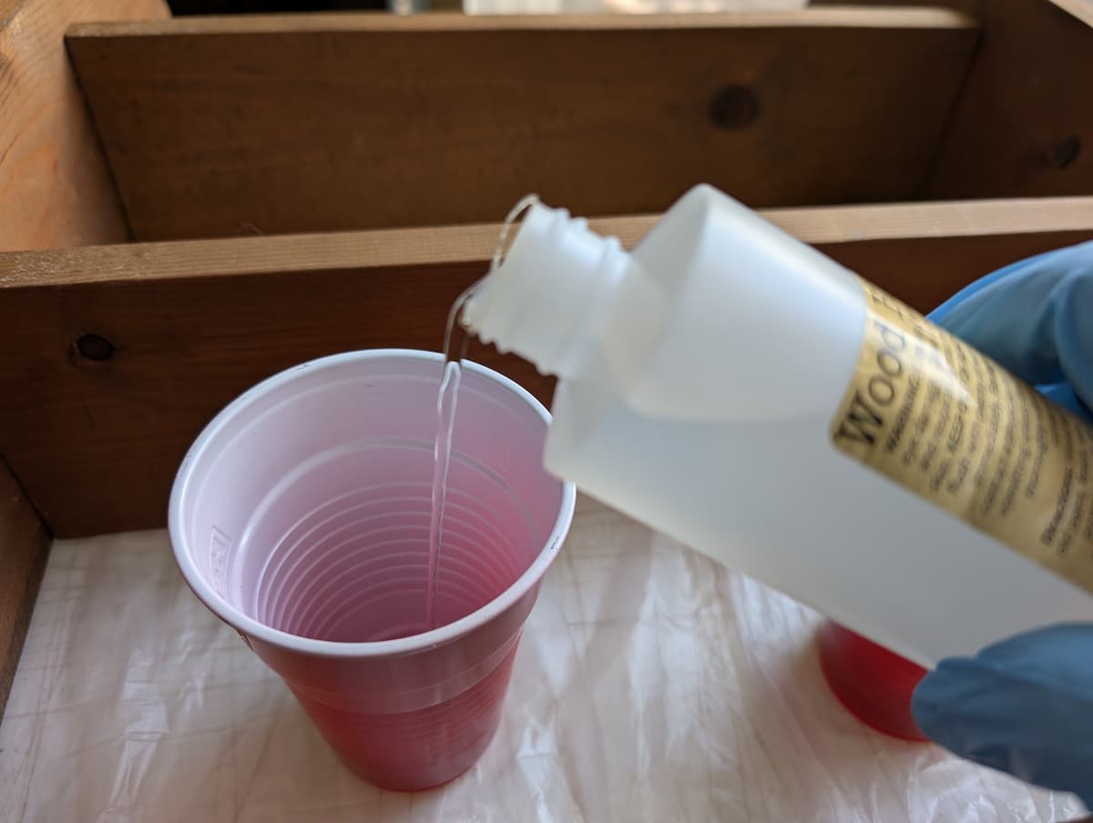 pouring product into cup