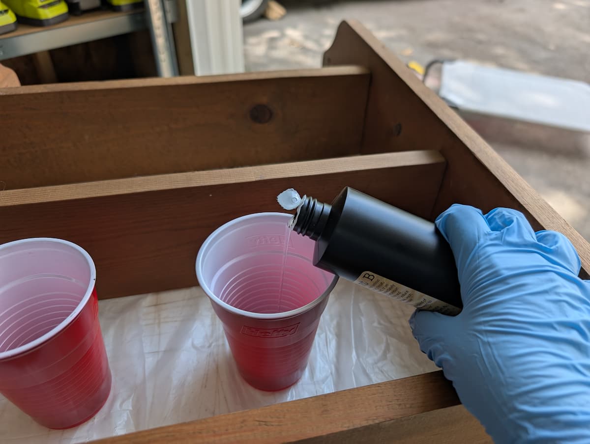 pouring product into cup