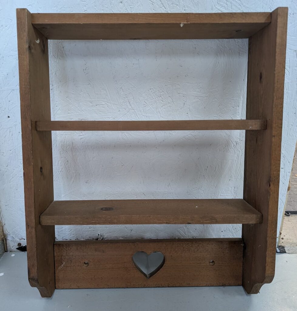dark wood shelf with heart detail