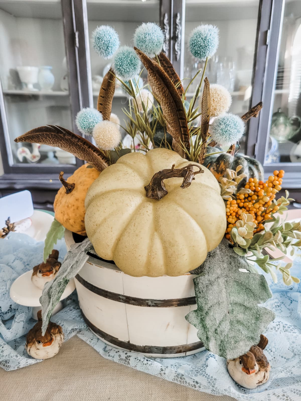 fall centerpiece with pumpkin