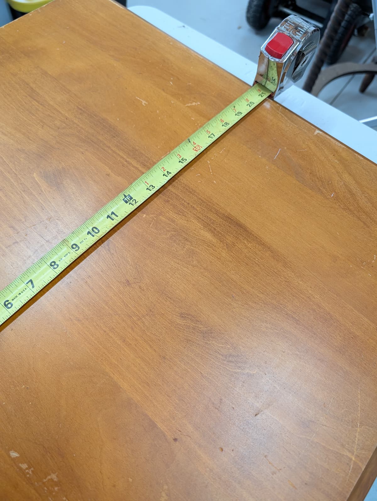 measuring tape and table top