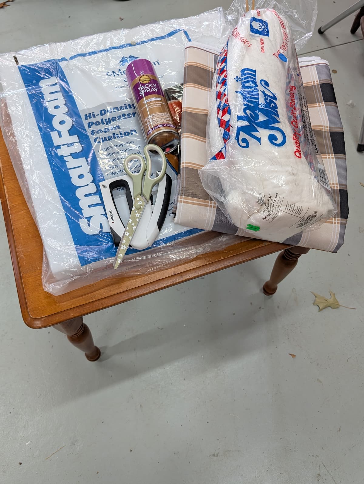 foam, batting, spray adhesive, stapler, and fabric