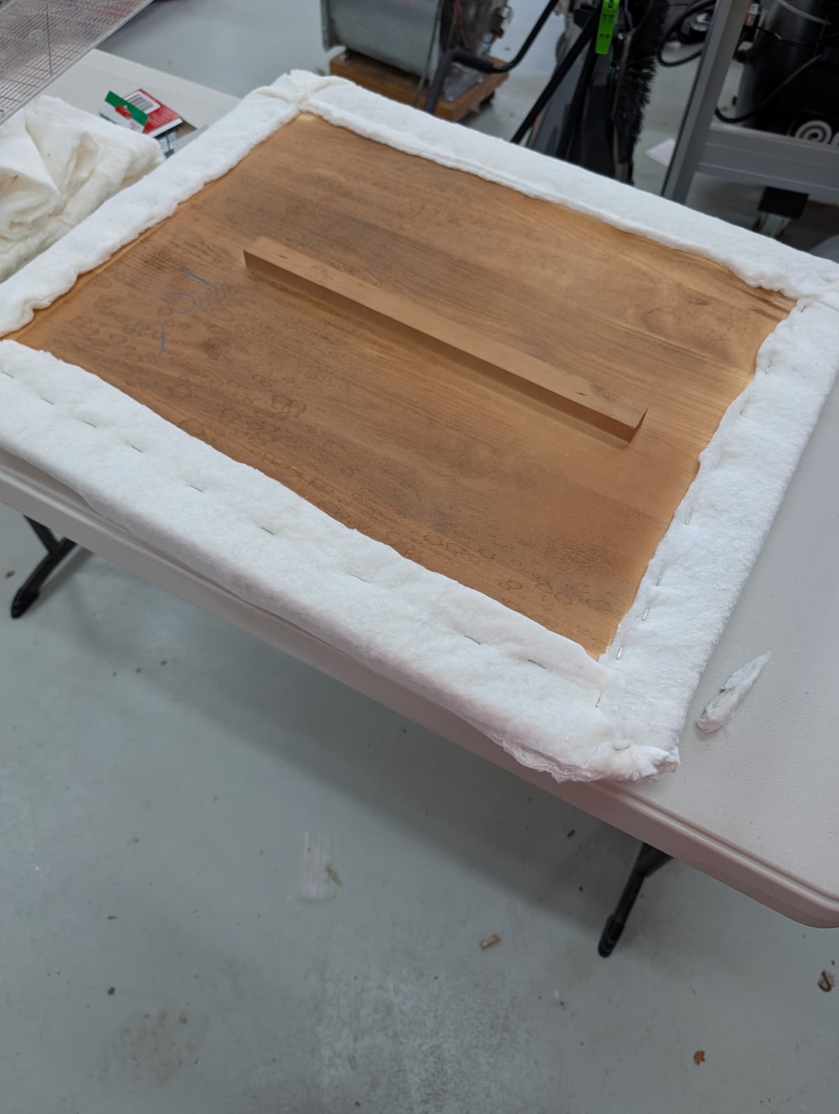 table top covered in batting